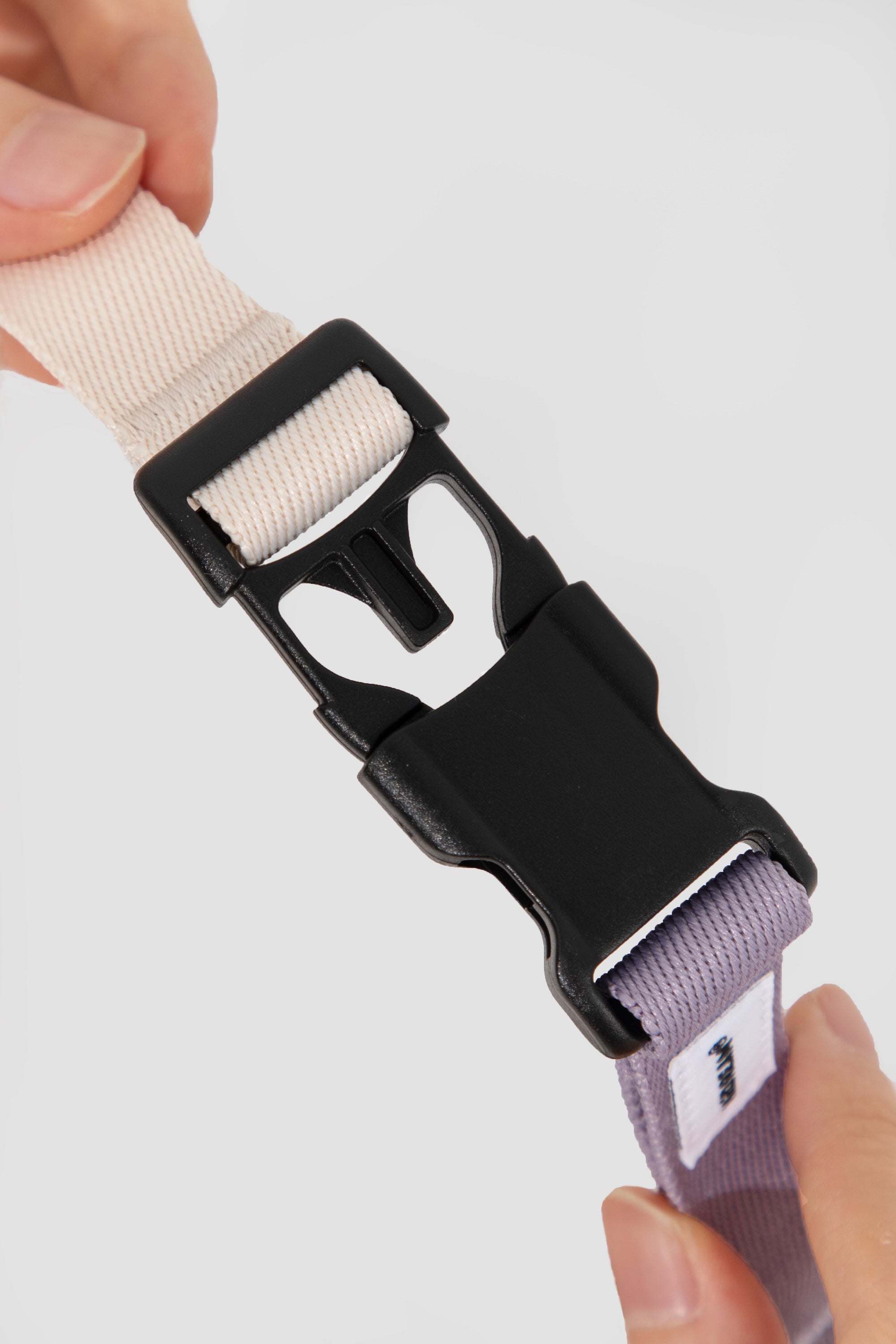 Close-up of the POM quick-release buckle on a martingale dog collar, showing easy fastening and secure closure.