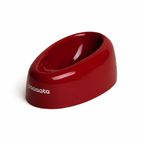 Red pet bowl with 'paaaata' branding on a white background