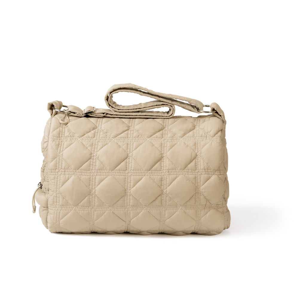 Khaki pet carrier on a white background