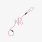 Pink braided rope dog leash with adjustable loop and metal ring, featuring a soft color palette and minimalist design