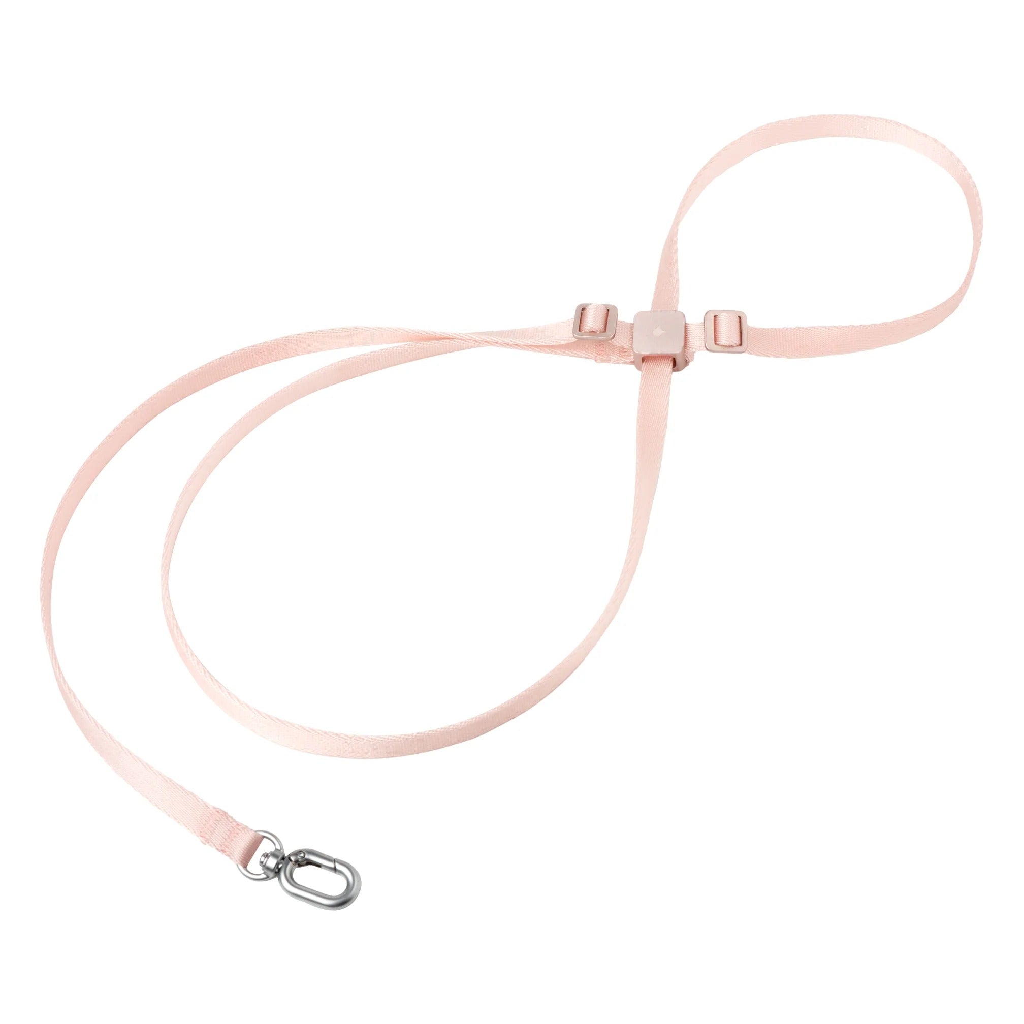 Pink cat harness featuring a square buckle, adjustable strap buckles, and metal ring on white background