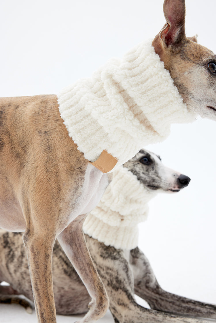 Close-up of soft sherpa dog neck warmer showing fluffy texture and cozy fit