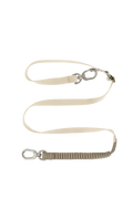 Flat lay of a beige shock-absorbing dog leash featuring an elastic bungee segment, adjustable strap, and metal swivel clip.
