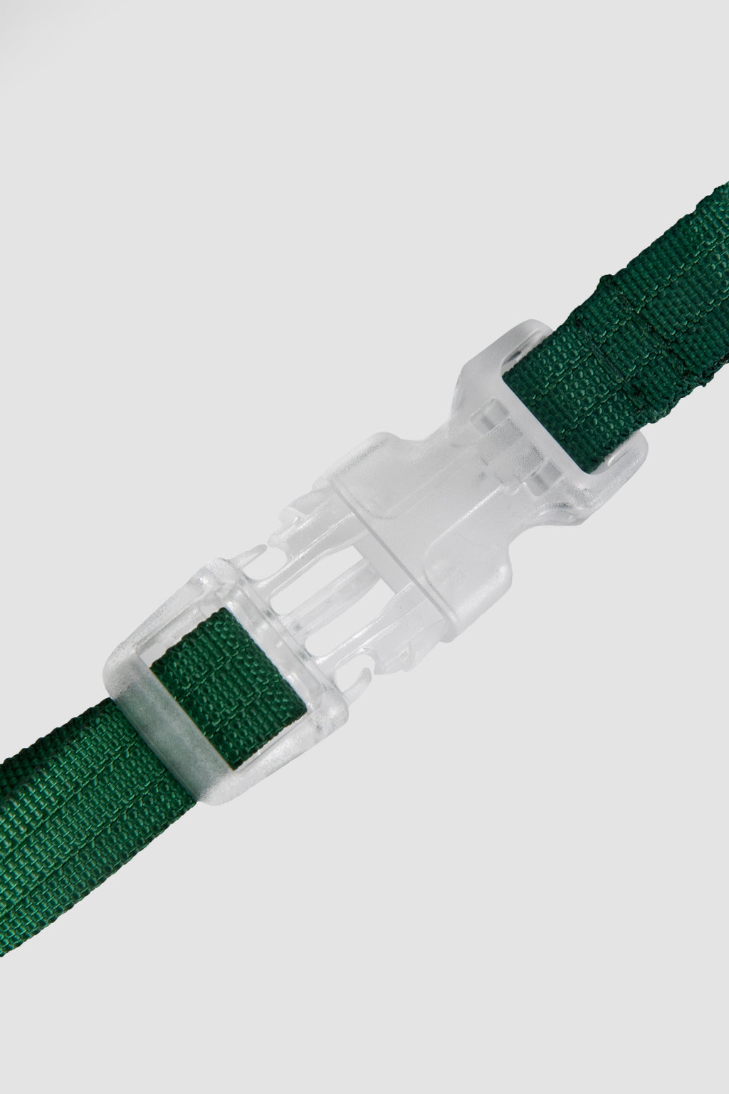 Transparent POM buckle detail on a cat harness, showing a secure, lightweight clasp designed for easy on-and-off without slipping.