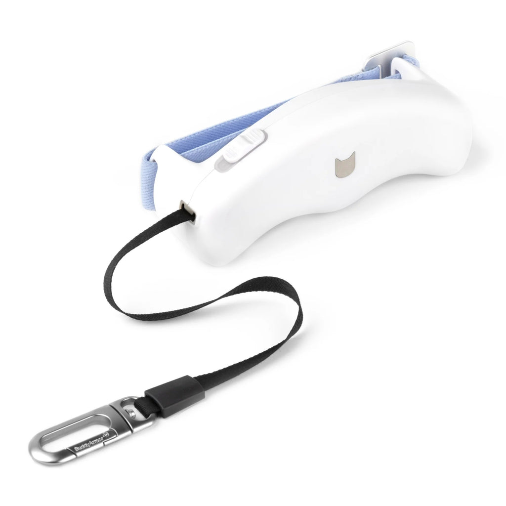 White retractable dog leash with strap and metal clip visible