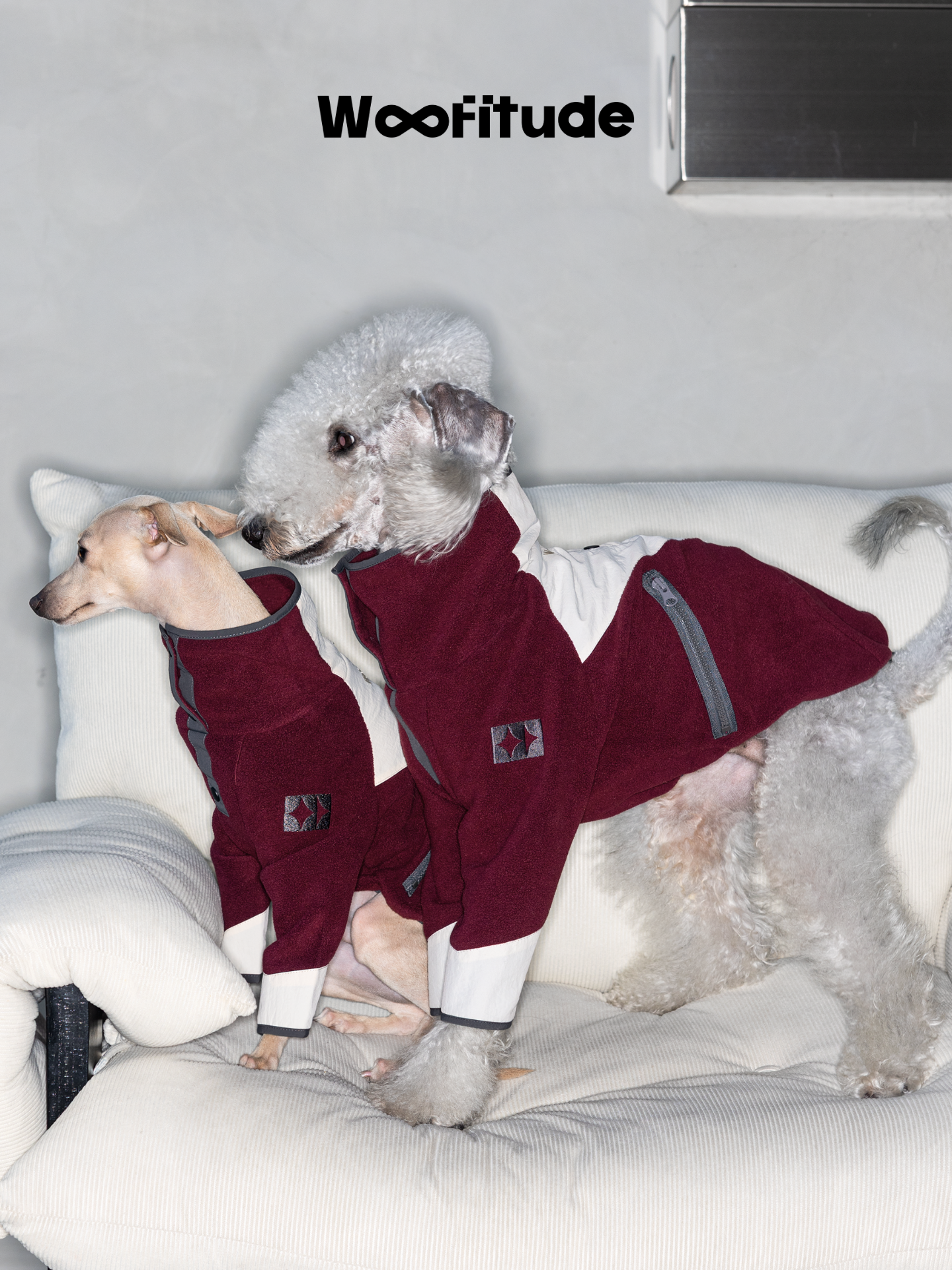  Bedlington Terrier wearing a burgundy polar fleece dog jumper with high collar and soft texture.