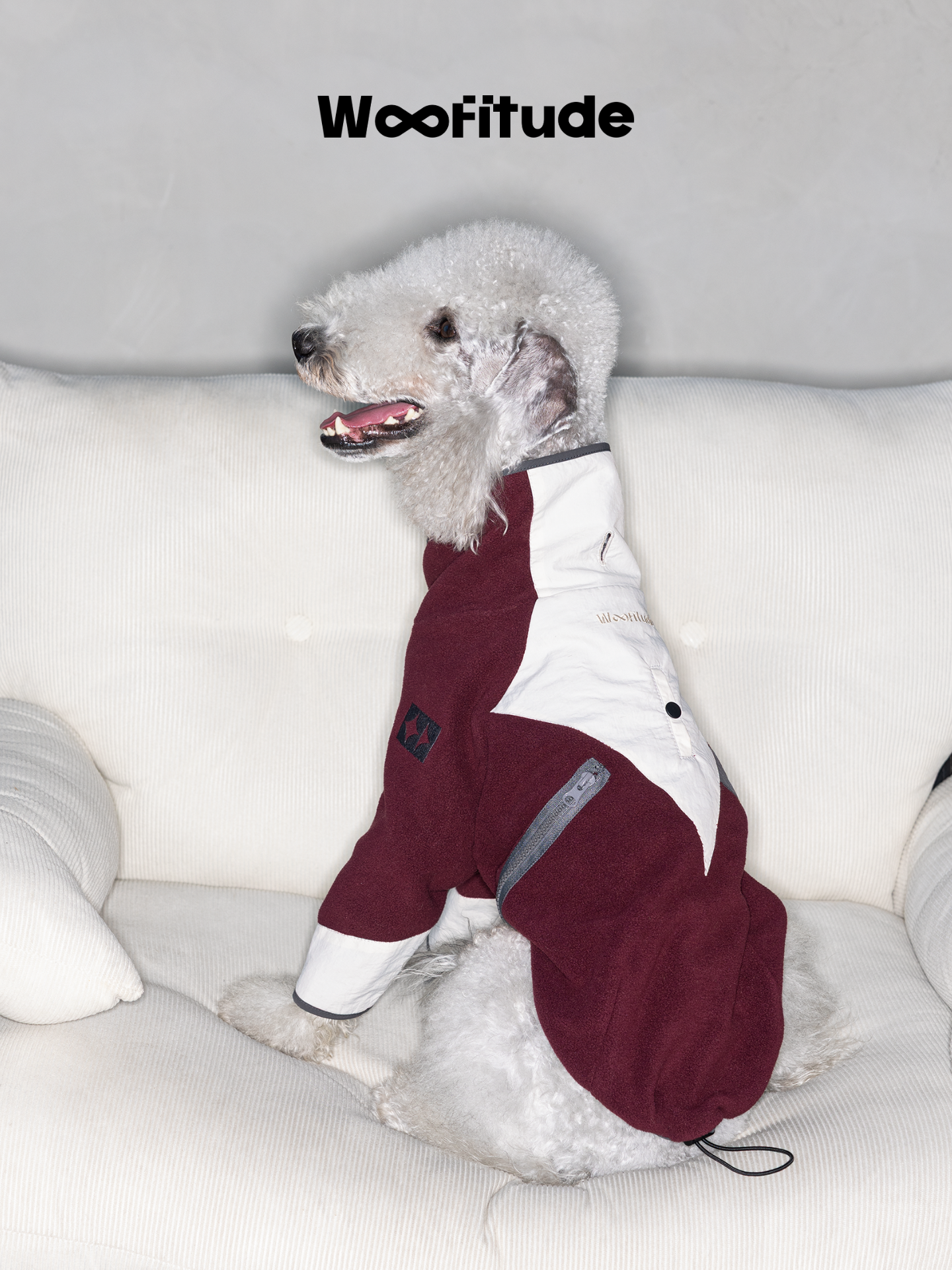 Side view of Bedlington Terrier in a polar fleece dog jumper highlighting lightweight warmth and relaxed fit.