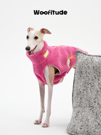 Side view of Italian Greyhound in a pink dog vest showing relaxed fit and adjustable drawcord detail.